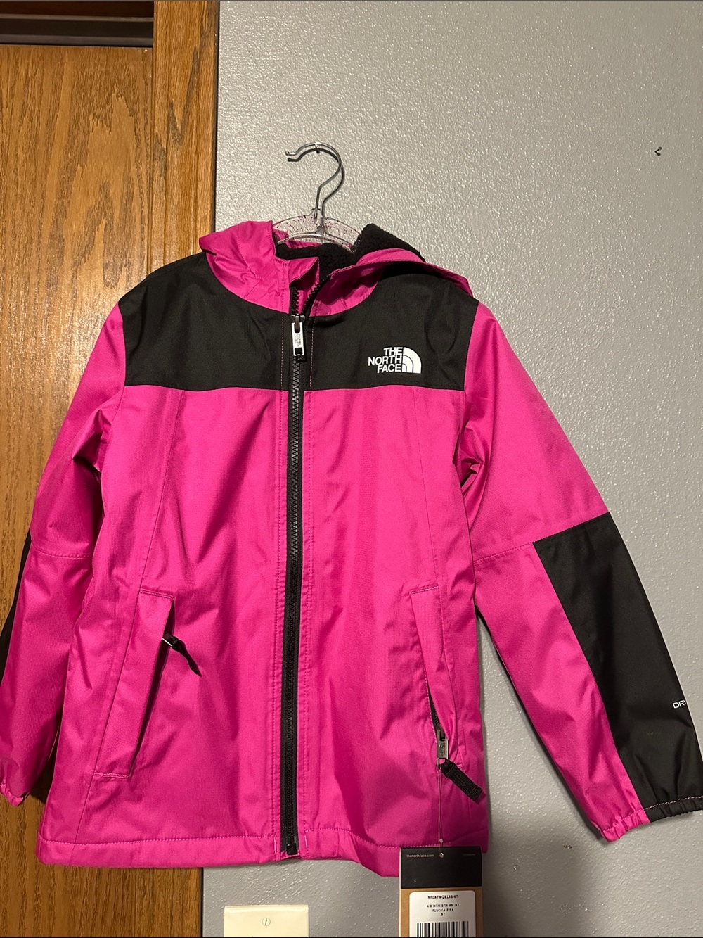 The North Face Kids Pink and Black Hooded Jacket. Size 6T